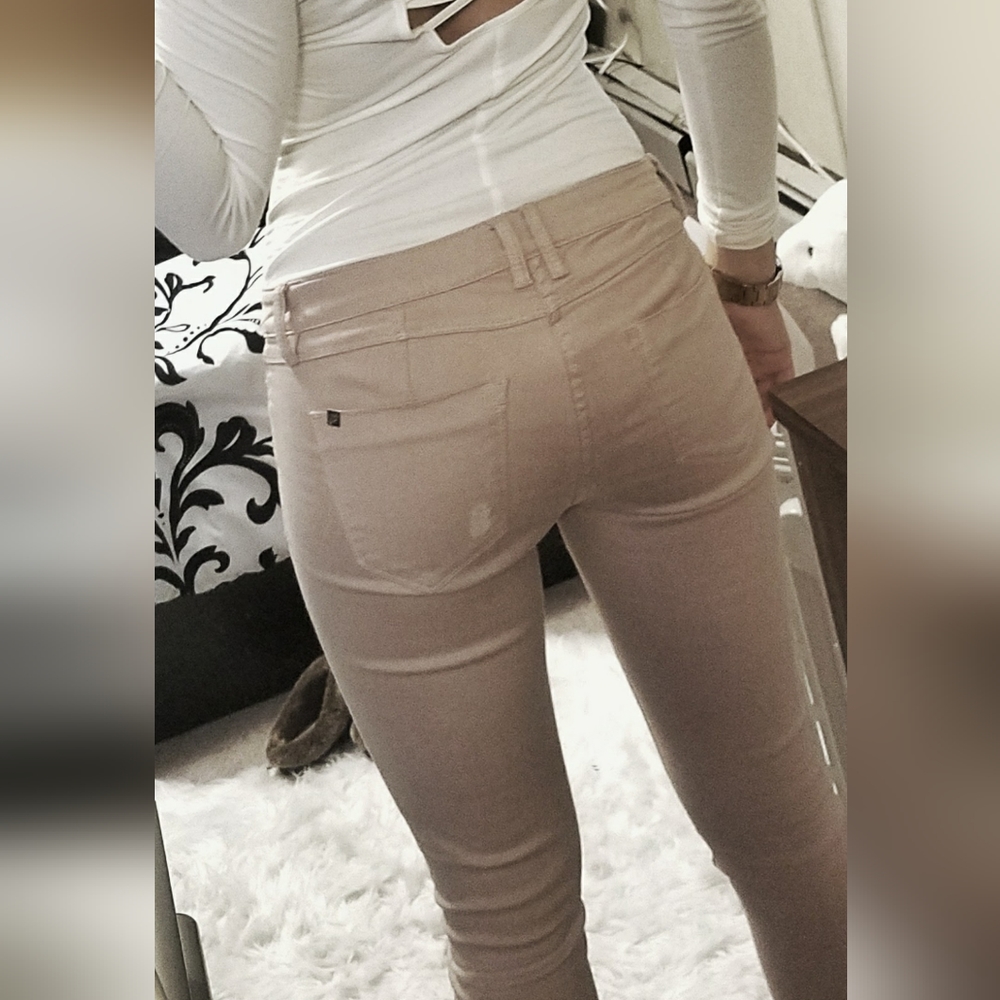 Bebe light pink ripped jeans